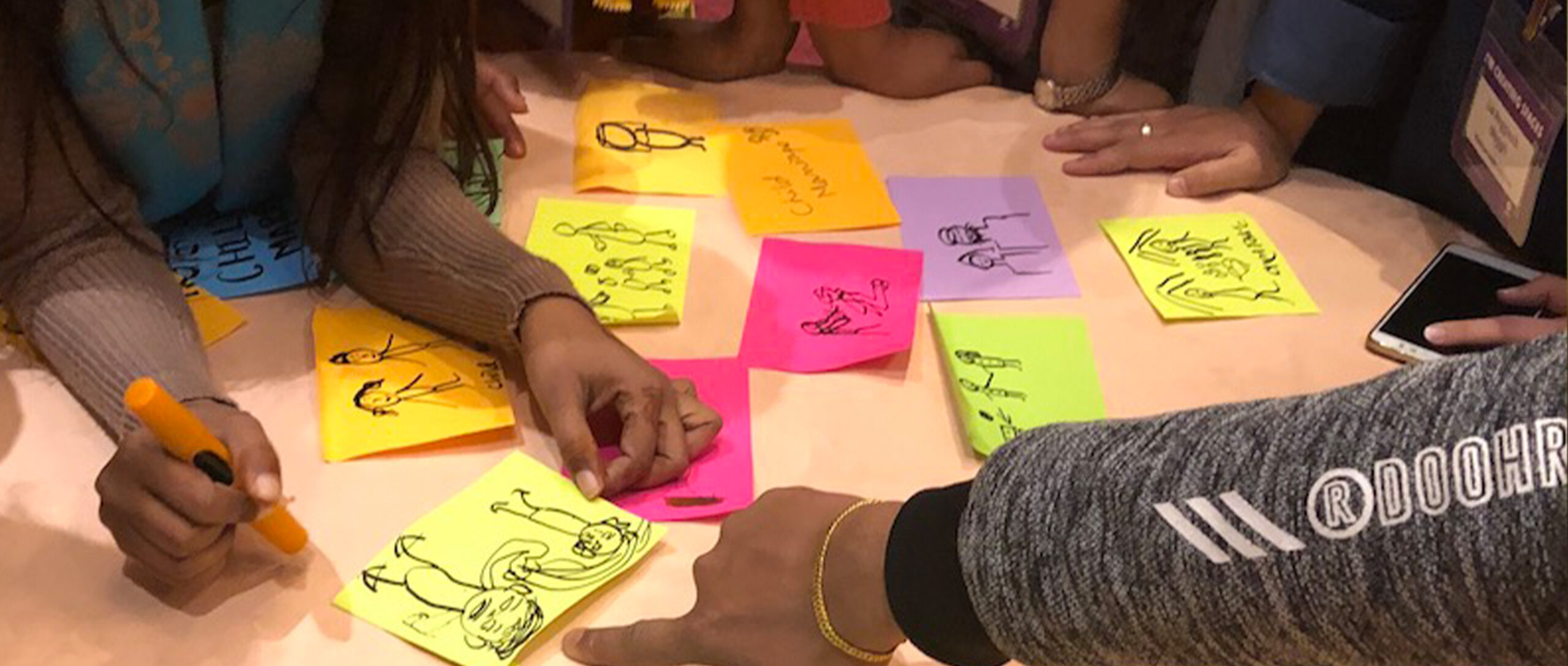 hands sketch-noting Oxfam Nepal